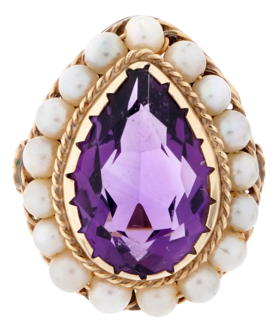 14k Gold Amethyst and Seed Pearl Ring: 14K Gold Band cabochon set pear form Amethyst Ring, Size 5.. Stone is approximately 15mm x 10mm, above a band of seed pearls. Marked 14k. Approximately 6 grams TW. Condition: Alterations: Original