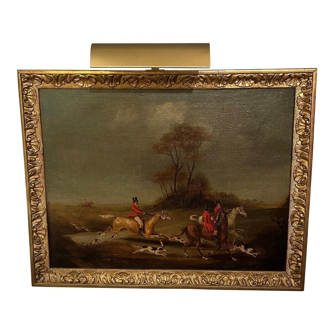 Vintage Hunt Scene Paintings - A Pair: Richly rendered vintage pair of detailed hunt scenes in a classic style, having men in red period jackets, white horses and handsome hounds. Framed beautifully and with attached brass lights on top. M