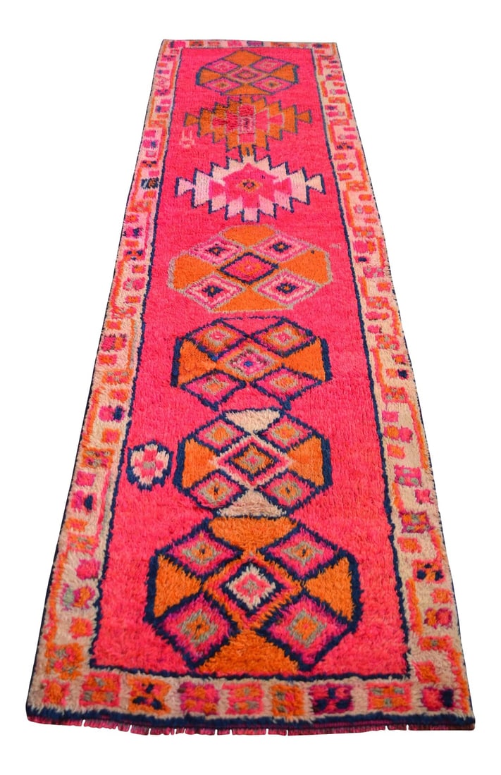1970s Kurdish Herki Hand-Knotted Hot Pink Tribal Runner - 2"²11"³ × 10"²8"³: Offered is a matchless Kurdish runner rug, made in Hakkari approximately 50-60 years ago. The beautiful wool on wool high pile features multicolored large geometric patterns on a hot pink background.