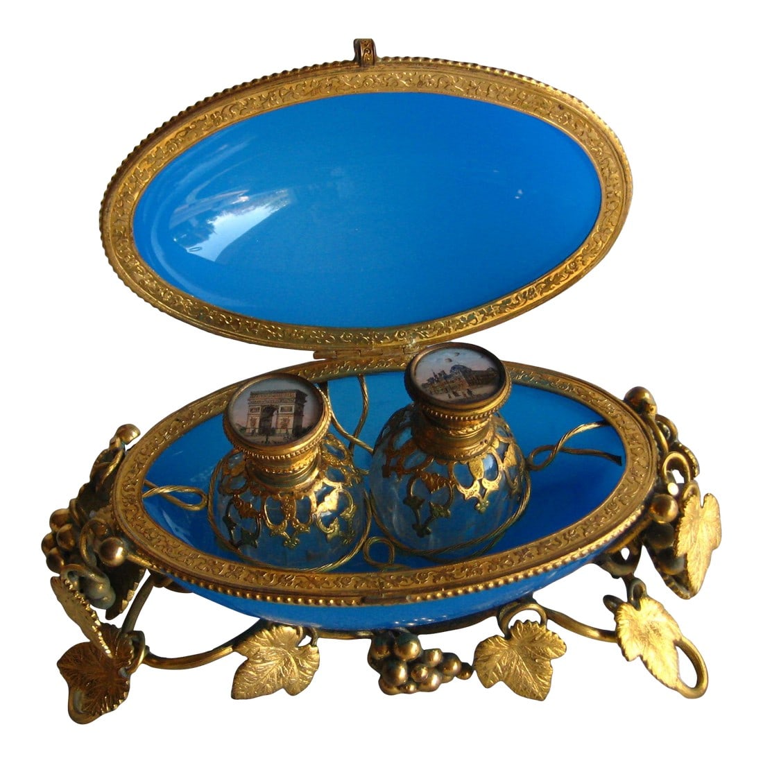 French Large Bleu Opaline Egg Box With Perfume Bottles View of Paris 19 Century: One of the best pieces we had for long time this large bleu opaline box in a shape of an egg is splendid , it contains crystal perfume bottles with painting of Paris scenes , the bottles are complete