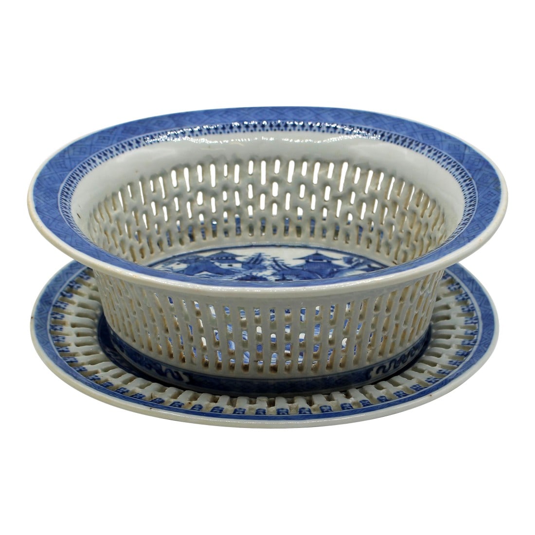 Circa 1870s-80s Chinese Blue & White Porcelain Chestnut Basket With Undertray: Circa 1870s-80s Chinese blue & white porcelain chestnut basket with undertray. Finely decorated with triangle & diaond blue borders & village on a lake scene, note the person crossing the bridge with