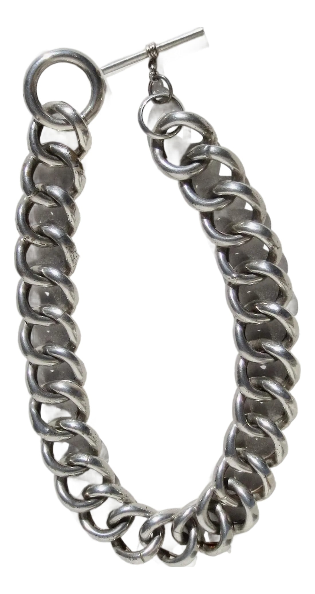 Large Hollow Link Sterling Silver Necklace: Marked 925, large hollow link chain with bar toggle. The chain measures 17" long and is 1.25" wide. A Big statement link. The weight is 3.10 ounces. A vintage 1960s necklace. There is no maker's mark 