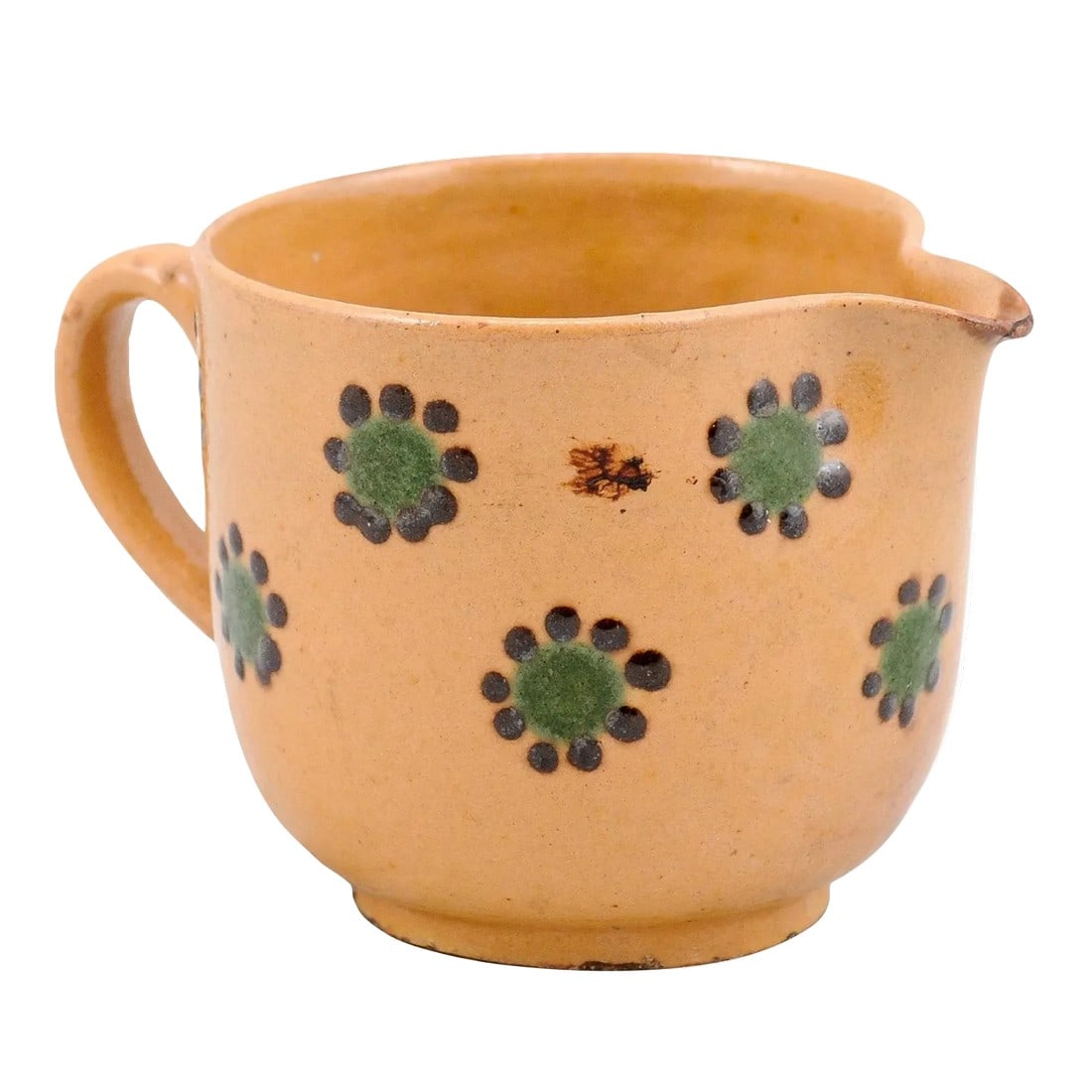 19th Century Rustic French Peach Glazed Pitcher with Green & Chocolate Décor: A French pottery pitcher from the 19th century, with peach glaze accented with green and chocolate décor. Created in France during the 19th century, this rustic pitcher features a peach colored