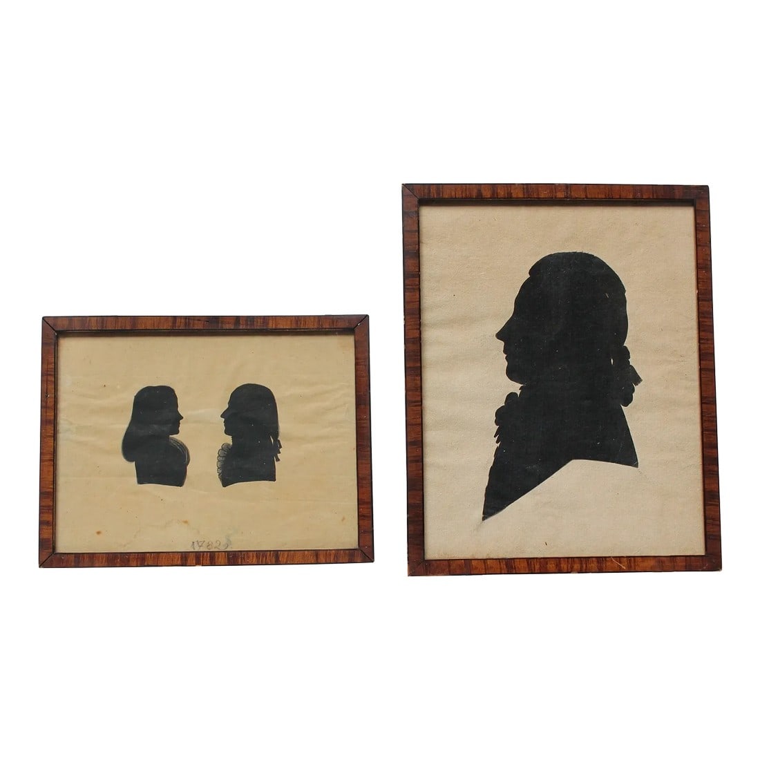 Set of Two Eighteenth Century American Antique Framed Silhouettes: Set of two early silhouette portraits dated 1787 and 1782, respectively, by unknown maker in nice period tiger maple frames. Wear commensurate with age (water spotting / wrinkling to the paper). Portr