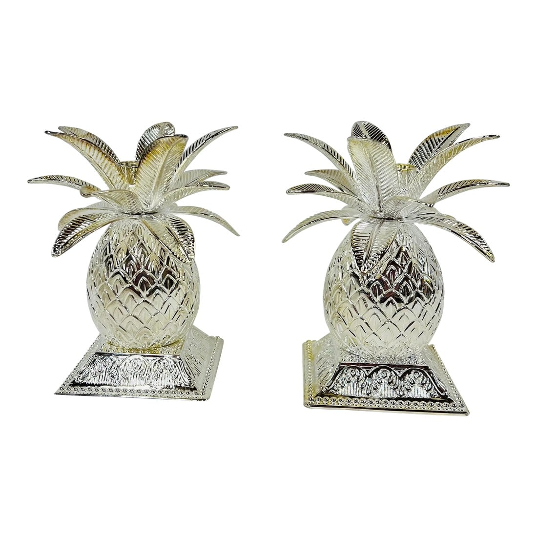 Godinger Silverplate Pineapple Candleholders - a Pair: Godinger silverplate pineapple candleholders. Each measures 3" square x 5" high. Condition: Alterations: Original Condition Unaltered Imperfections: Some Imperfections Condition Notes: Minor tarnish