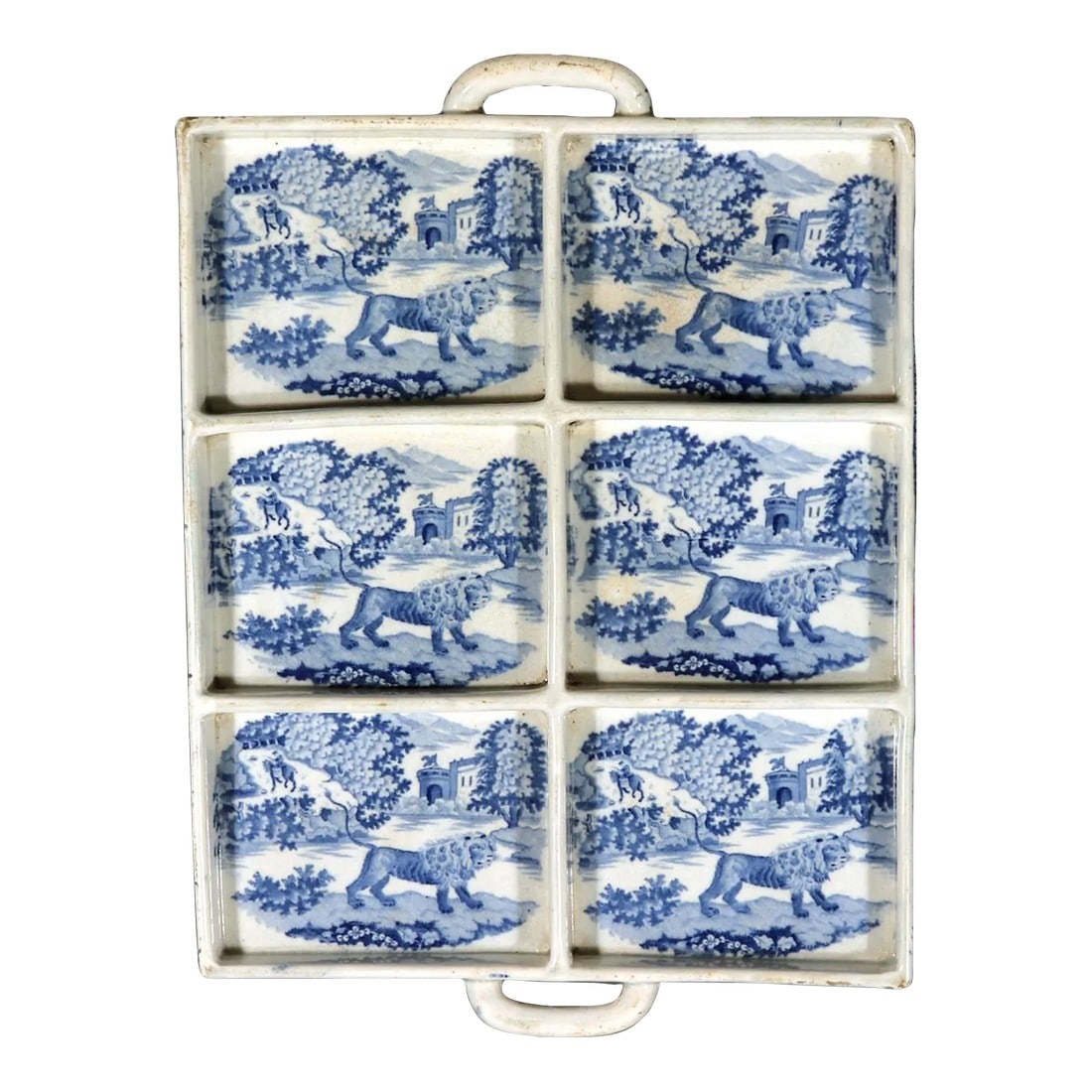 Large Pearlware Blue Printed Tray With the Angry Lion Pattern: English Pearlware Pottery Blue Printed Tray, The Angry Lion Pattern, Circa 1815-20 The English pottery footed tray is pearlware and is printed with a rare pattern known as "The Angry Lion" by a