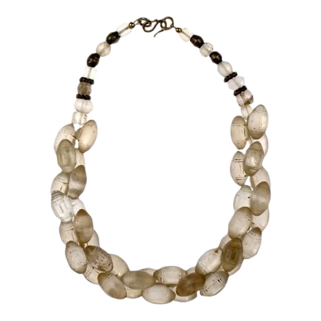 Early 20th Century African Trade Beads Necklace: A Necklace made from Rare African Trade Beads, 19.75" with Vintage Brass Accent Beads and a Brass Clasp. The clusters of beads create a chain which is about 1" in diameter. Individual beads are: 1w x