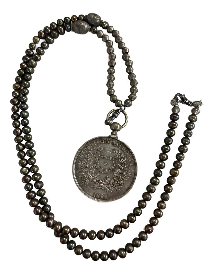 Late 19th Century Cultured Pearl and Medal Necklace: A Belgium National 1880 Exposition Medal Pendant on a 38" Necklace of Cultured Pearls with Vintage Ethiopian Metal Accent Beads. Pendant bail opens allowing Medal to be removed or additional charms