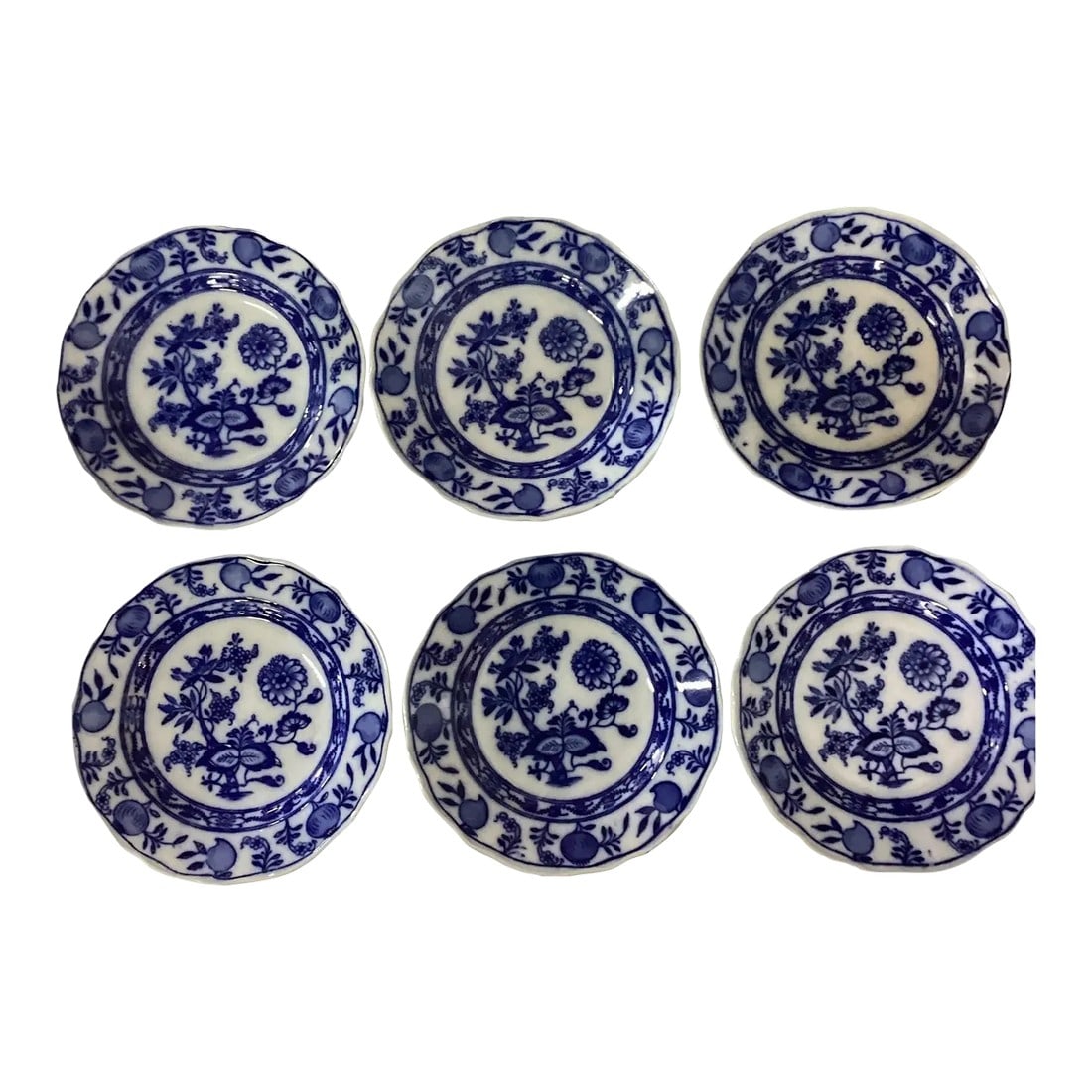 Early 20th Century Meissen Blue Onion Side Dishes - Set of 6: A set of six Meissen Blue Onion bread and butter plates. Each of these plates is stamped on the bottom. No visible chips or damage. This set of six small plates are from the early 20th century, Englan