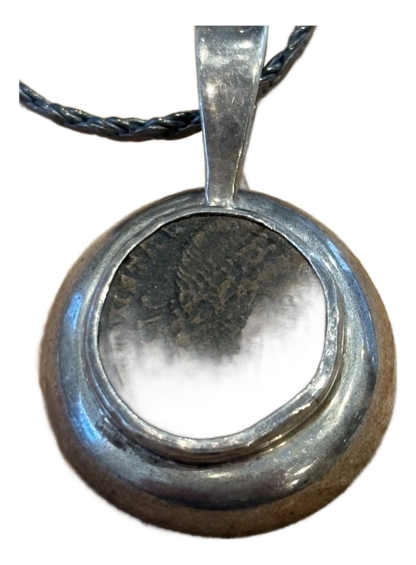 Antique Pendant With Coin of Emporer Constantine II W Sterling Silver: A wonderful silver pendant made from a Roman coin of Emperor Constantine II from 323-337. This is an artisan-made custom pendant with a unique sterling silver setting. The anodized 17.5" silver chain
