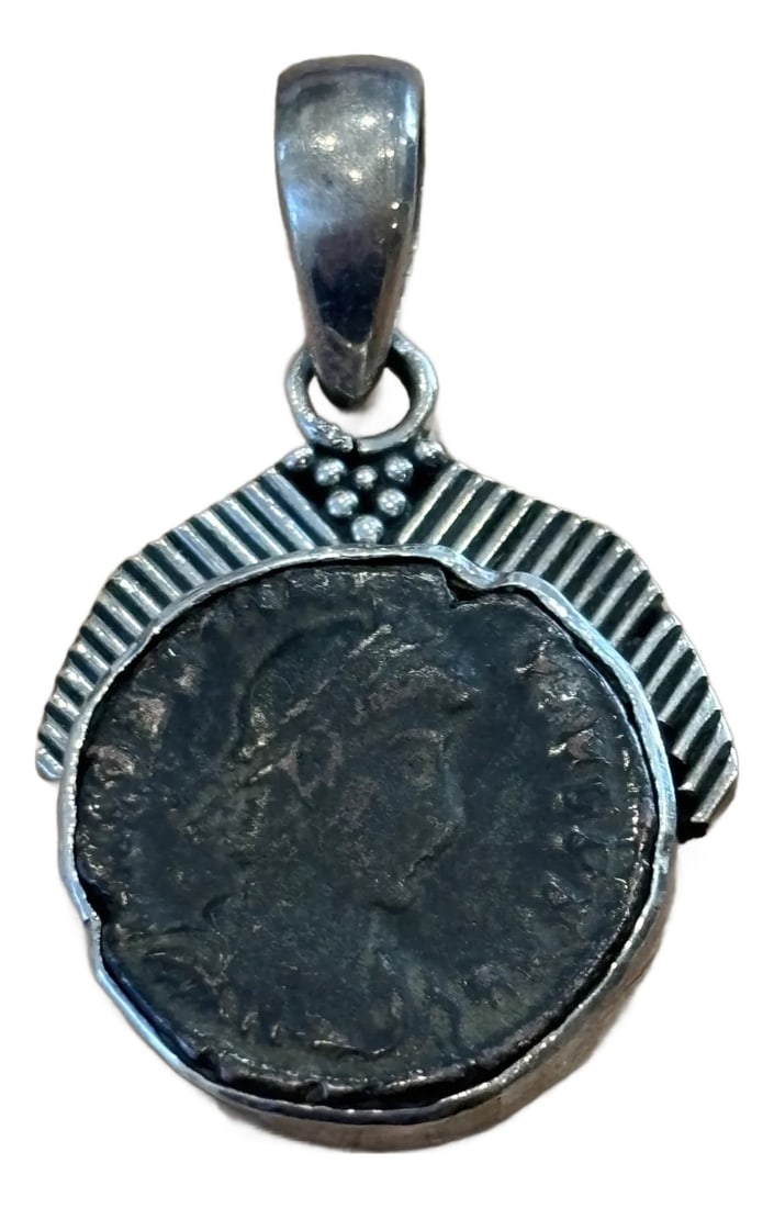 Antique Pendant With Roman Coin and Sterling Silver Setting of Diagonal Frame: A wonderful silver pendant made from a Roman coin of Emperor Valentinian I from 364-375 AD. This is an artisan-made custom pendant with a unique sterling silver setting (stamped 945?). The anodized 17