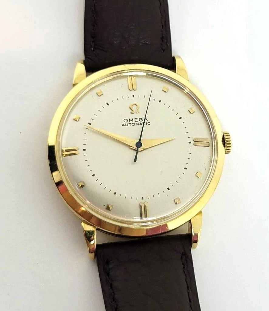 Solid 18k OMEGA Mens AUTOMATIC Watch* Cal 351 Ref 2643 c.1950* SERVICED* EXLNT: Reserve: $2,499.00 Shipping: Domestic: Flat-rate of $43.00 to anywhere within the contiguous U.S. International: Foreign shipping rates are determined by destination. International shipping may be sub