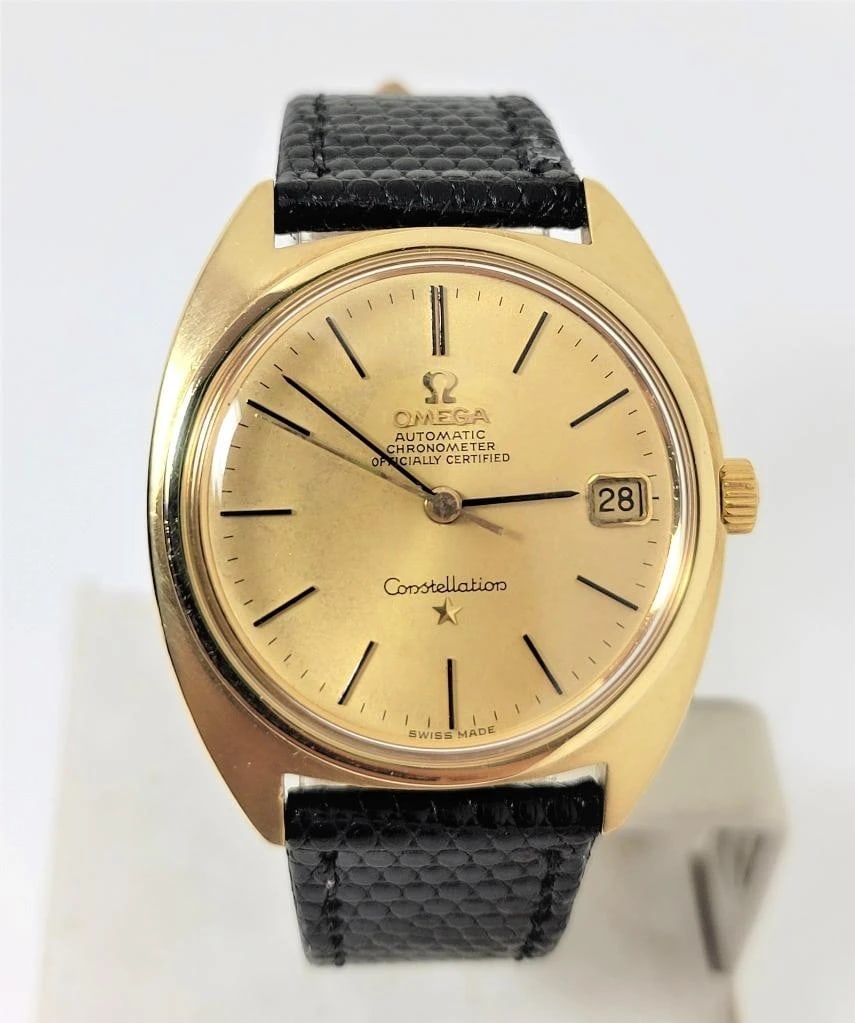Vintage 18k OMEGA CONSTELLATION CHRONOMETER Automatic Watch 1966 Cal 561* EXLNT: Vintage Solid 18k Yellow OMEGA CONSTELLATION CHRONOMETER Automatic Watch c.1966 Cal.561* EXLNT Condition* Original Dial This Men's Omega watch is Swiss made. Great present for yourself or someone you 
