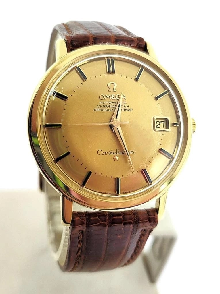Vintage 18k OMEGA CONSTELLATION Automatic Watch c.1964 Cal.561* 168004/14 EXLNT: This Mens Omega watch is Swiss made. Great present for yourself or someone you love as well as for vintage collectors or enthusiasts! * Solid 18k yellow gold case back in shiny finish * Back with inne