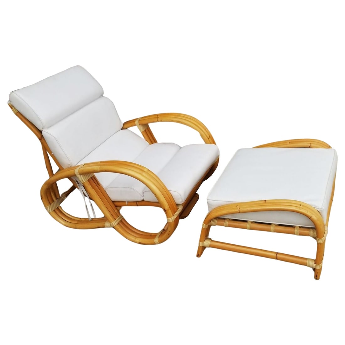 Restored Reverse Pretzel Three Strand Lounge Chair and Matching Ottoman: Title: Restored Reverse Pretzel Three Strand Lounge Chair and Matching Ottoman Description: This beautifully restored Paul Frankl-inspired three-strand rattan lounge chair and matching ottoman showcas