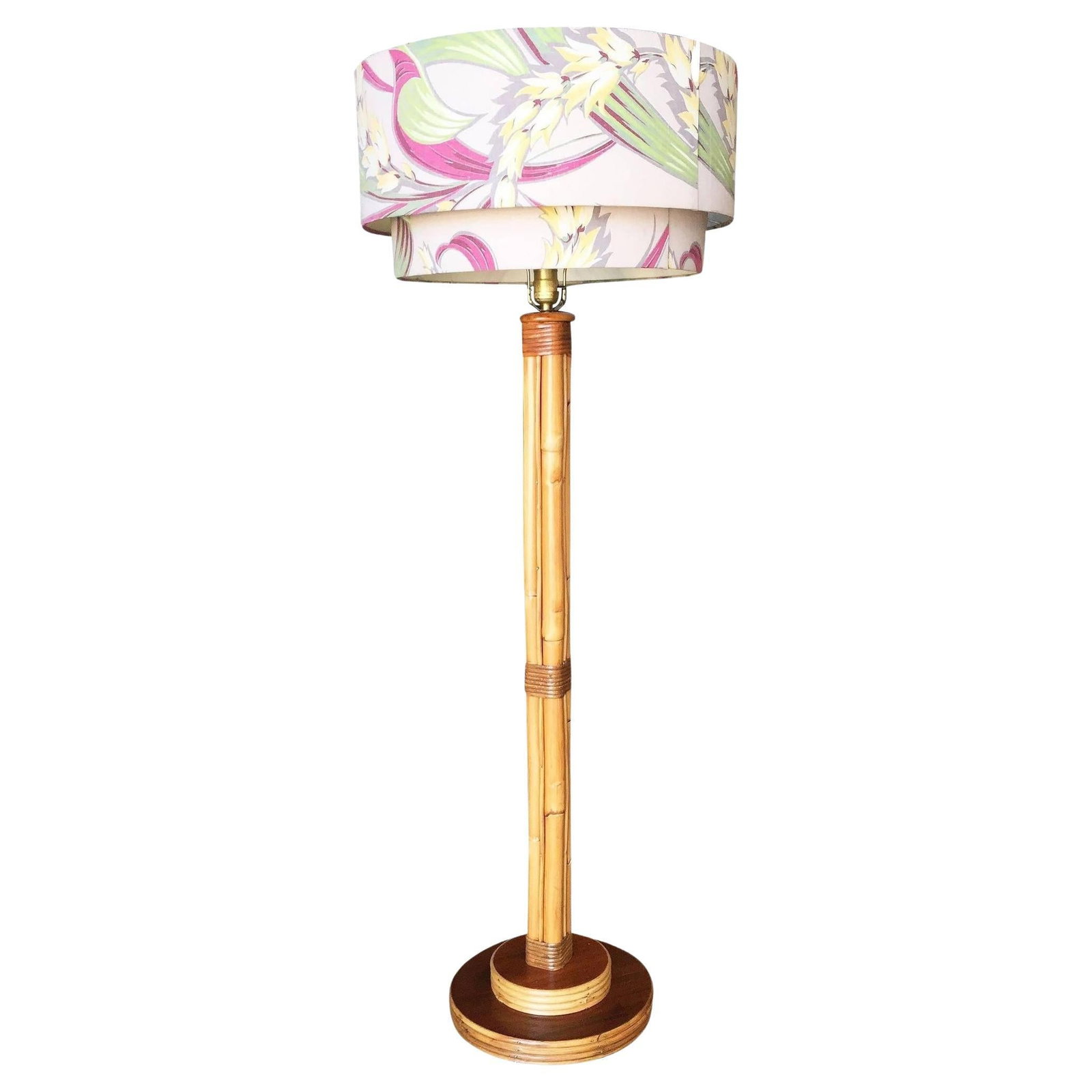 Restored Rattan & Mahogany Pole Floor Lamp: Title: Restored Rattan & Mahogany Pole Floor Lamp Description: Rattan pole lamp featuring 6 decorative rattan poles centered around a rattan post all fixed to a Mahogany base with reed rattan trim. Th