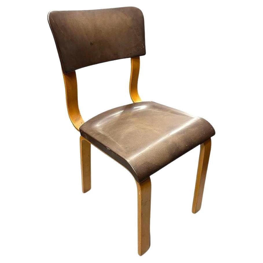 Art Deco Thonet Bentwood Dining Chair w/ Bakelite Seat: Title: Art Deco Thonet Bentwood Dining Chair w/ Bakelite Seat Description: This original Thonet bentwood armchair features a Bakelite seat and backrest. The chair's bentwood beech frame is elegantly c