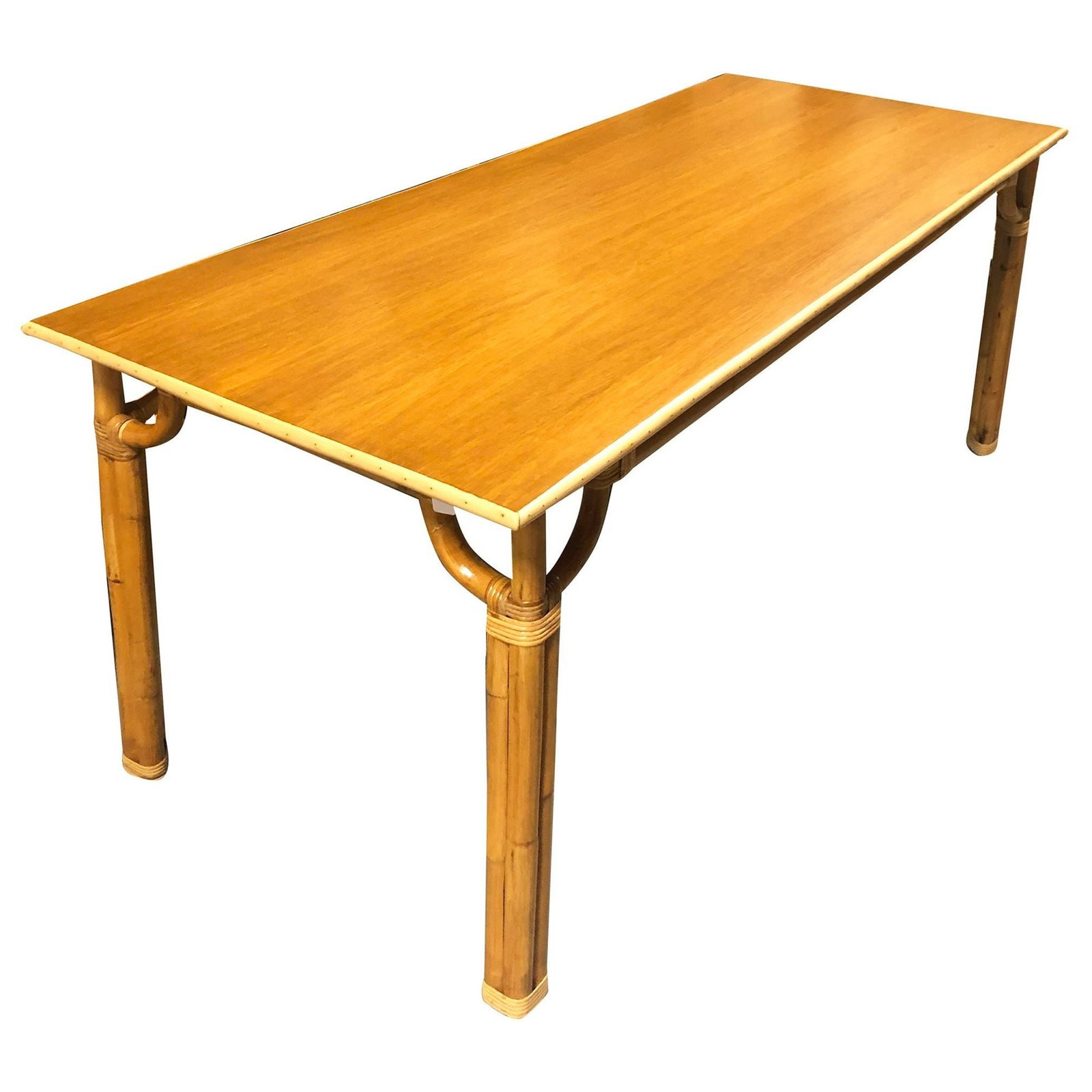 Restored Rattan Three-Strand Long Dining Table: Title: Restored Rattan Three-Strand Long Dining Table Description: This beautifully restored Paul Frankl-inspired Mid-century rattan three-strand long dining table. Crafted with a large Mahogany wood 