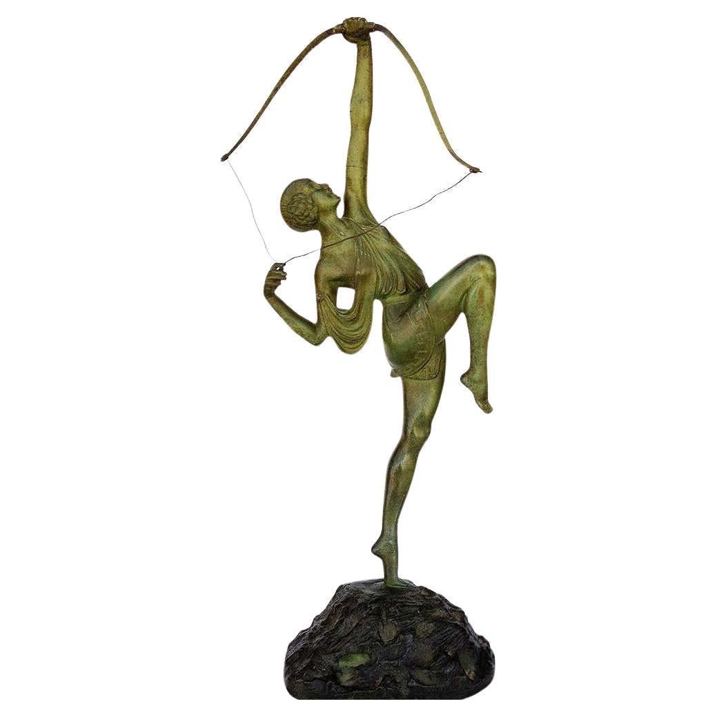 Tireuse A L'arc Bronze Greek Archer Diana Sculpture by Pierre Le Faguays: Title: Tireuse A L'arc Bronze Greek Archer Diana Sculpture by Pierre Le Faguays Description: Designed by French sculptor Pierre Le Faguays in 1925, this Art Deco bronze statue features a young Grecian