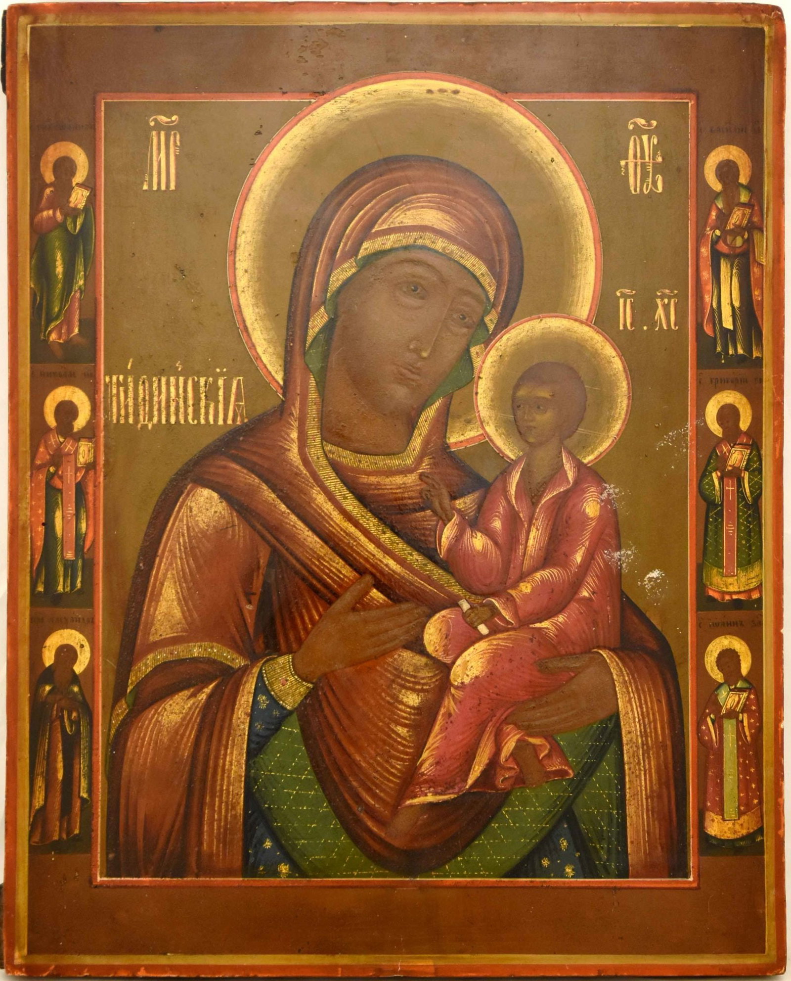 Our Lady Hodegetria Eleusa of Tichvin: Details: Dimensions 29.5 × 37.5 cm Century 19 Additional Information: Our Lady Hodegetria Eleusa of Tichvin, selected Saints on the borders of icon. Large Russian wooden icon. Reserve: $1,70