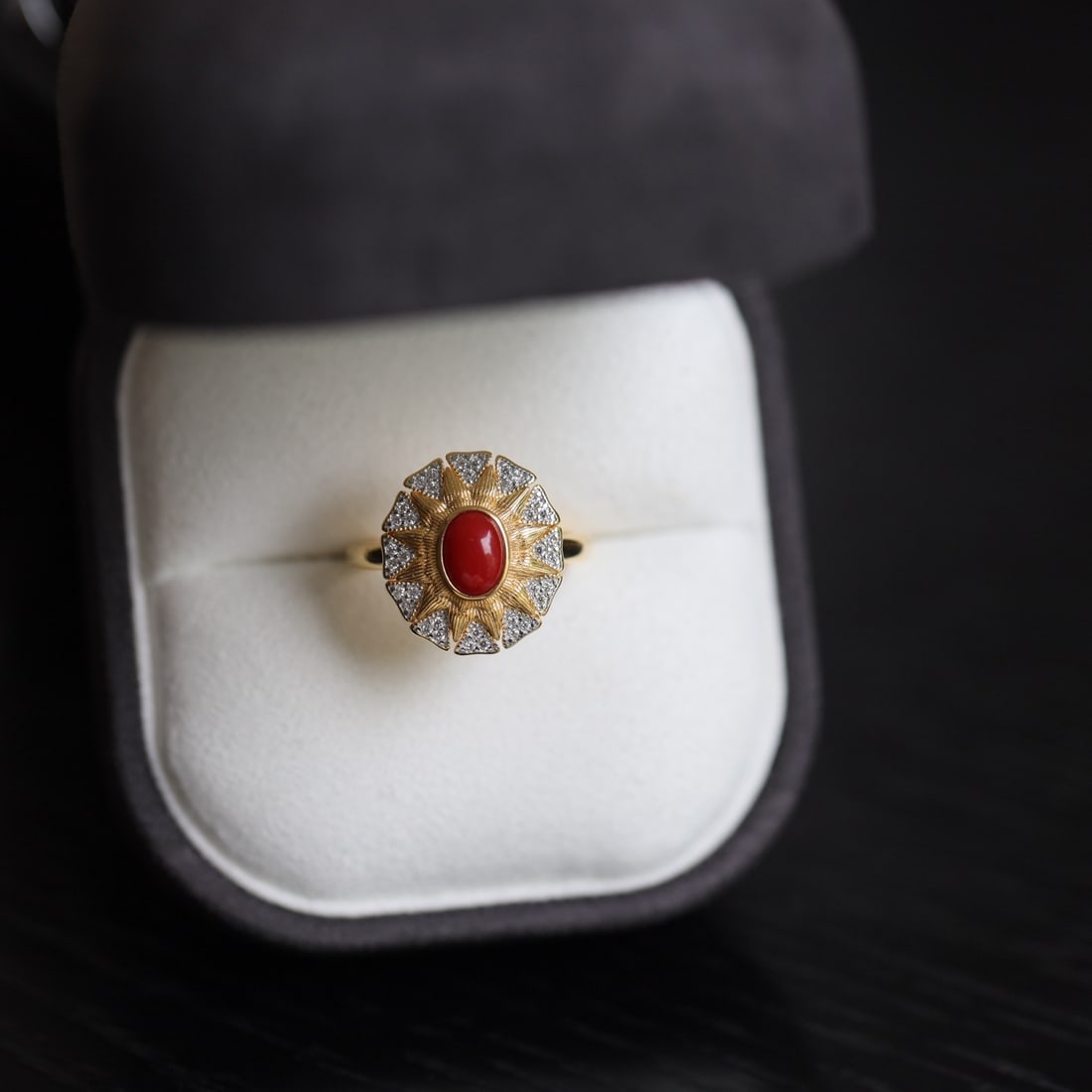 S925 Sterling Silver Natural Red Coral Earrings: This Earrings features a natural red coral as the centerpiece, set in S925 silver with a sunburst design. The vibrant coral is encircled by gold accents and diamond embellishments, exuding a refined