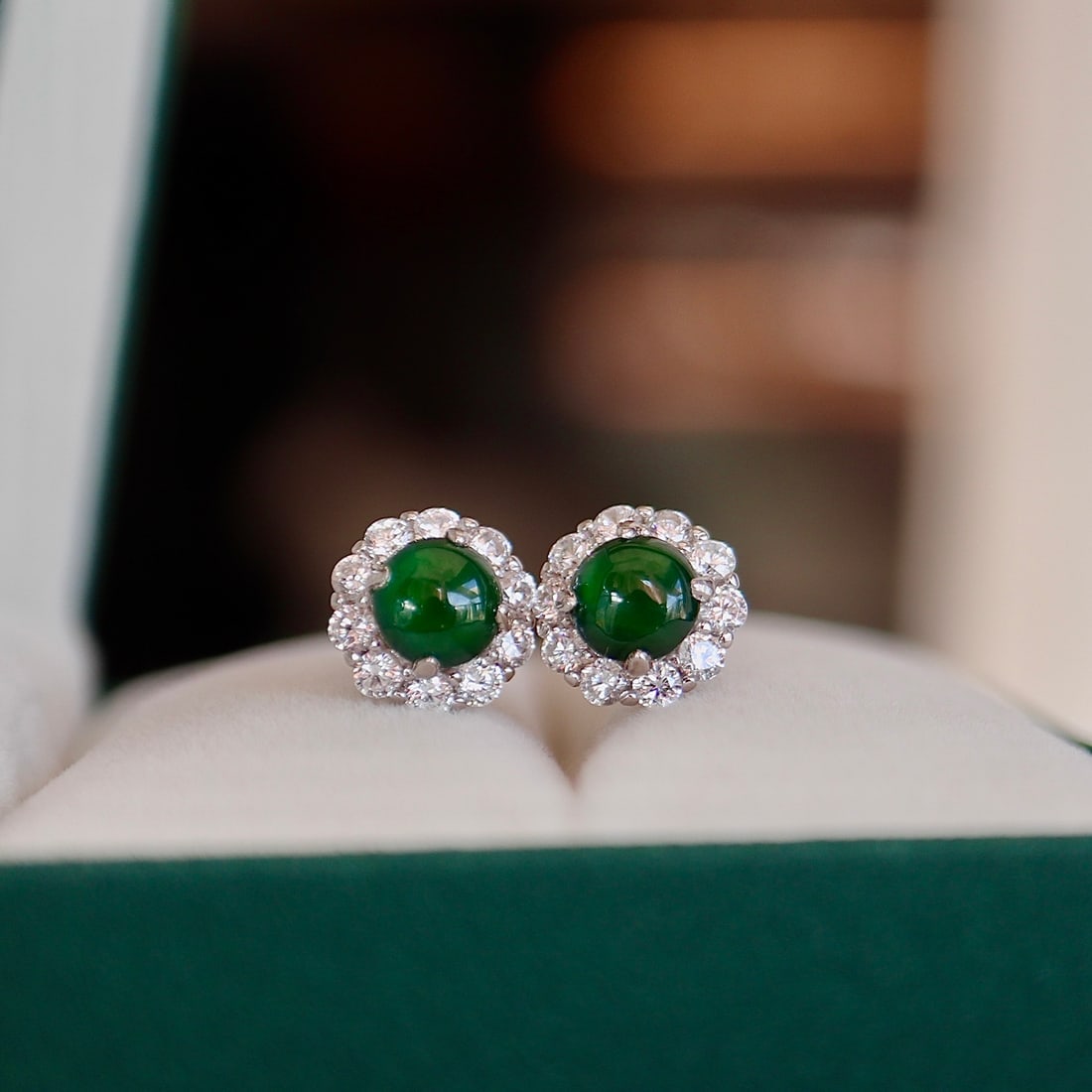 S925 Sterling Silver Natural Jadeite Stud Earrings: These earrings are made of natural jadeite, showcasing a rich gold and cool white hue that perfectly captures the natural charm of jadeite. The large diameter design is simple yet sophisticated, and t