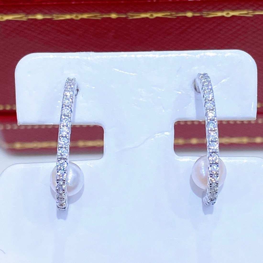 Sterling Silver Natural Akoya Pearl Earrings: These earrings feature natural, untreated Akoya pearls with a diameter of 4.5-5mm, showcasing a perfect round shape and minimal blemishes. Their classic design makes them suitable for any age and occa