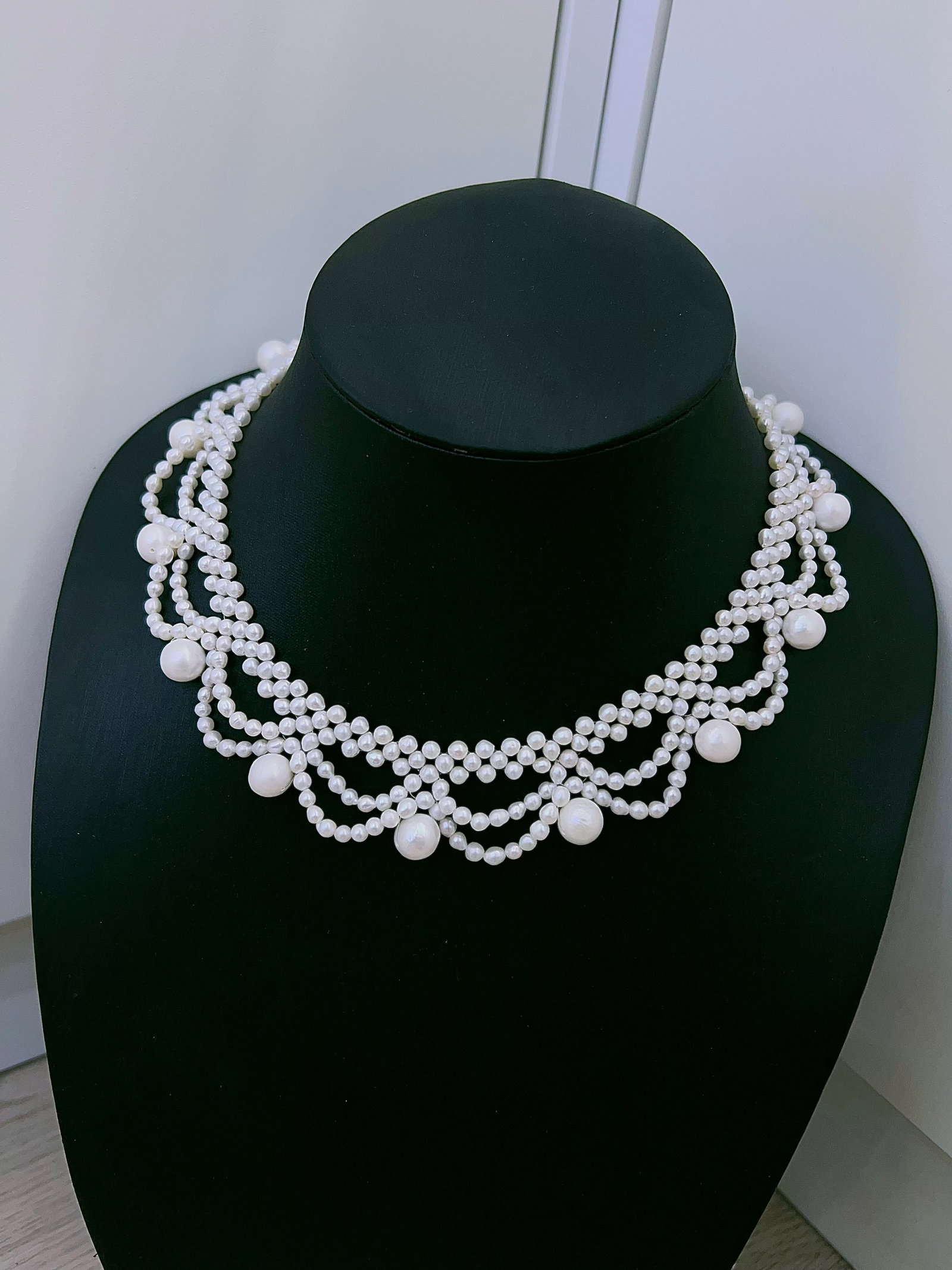 French Woven Necklace: This necklace is crafted with a unique French weaving technique, showcasing elegant design and luxurious texture. Each piece is meticulously handcrafted, perfectly blending rich gold tones with cool w