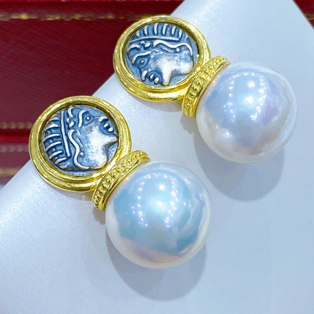 925 Silver Natural Edison Pearl Earrings: These earrings are crafted from 925 silver and feature natural Edison pearls with a diameter of 12-13MM. The pearls are large, perfectly round, and nearly flawless, exuding a radiant glow reminiscent 