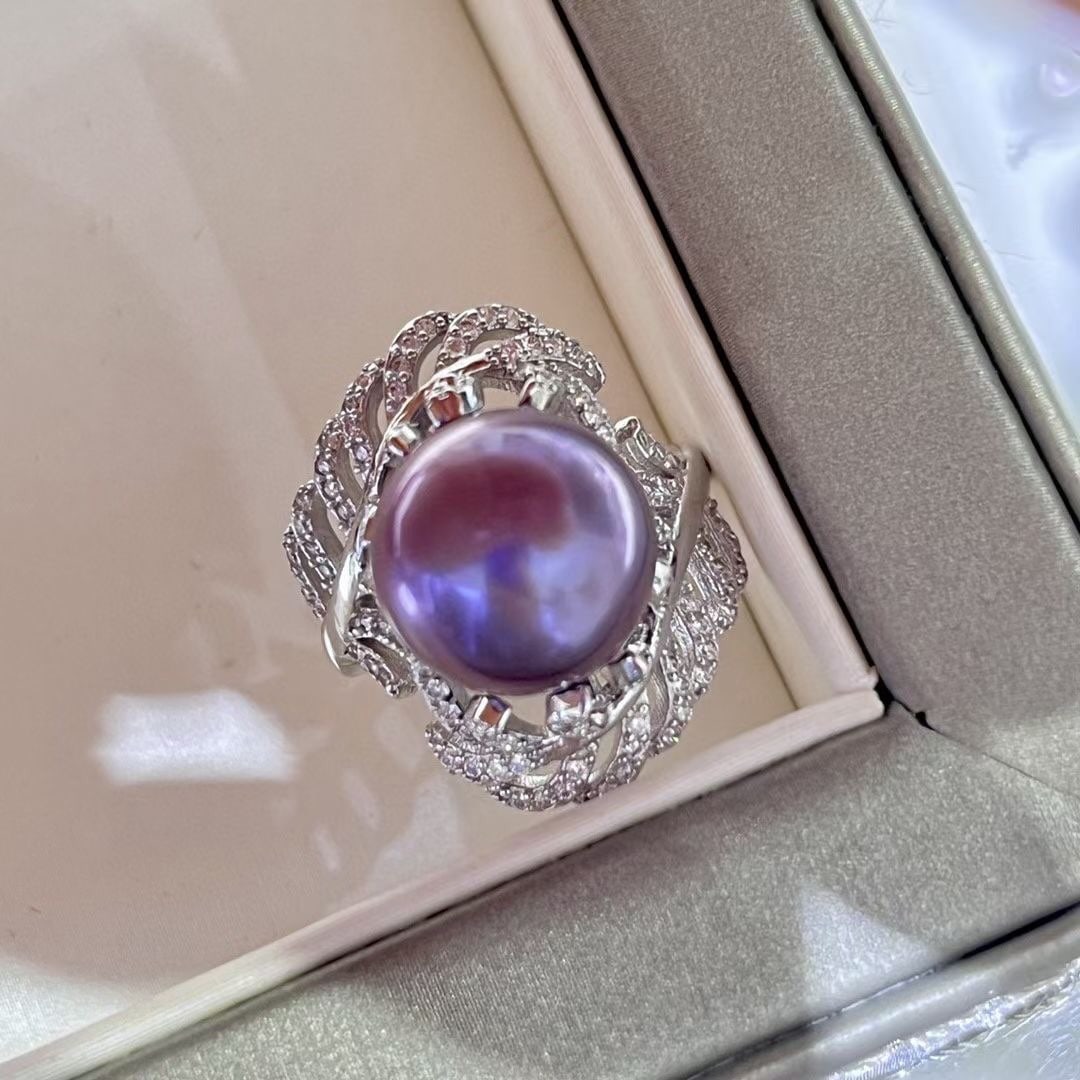 925 Silver Natural Freshwater Pearl Ring: This ring features natural freshwater pearls with a diameter of 12-13mm, showcasing an enchanting purple hue. The pearls are nearly flawless and perfectly round, complemented by a 925 silver feather d