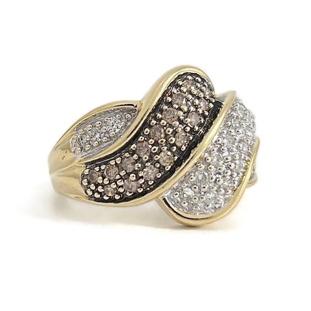Cognac and White Diamond Cocktail Statement Ring 14K Yellow Gold, 5.36 Grams: Cognac and White Diamond Cocktail Statement Ring 14K Yellow Gold, 5.36 Grams This is a beautiful ring! Please let us know if you have any questions. Diamonds: .71 ctw, 19 round cognac and 19 round bri