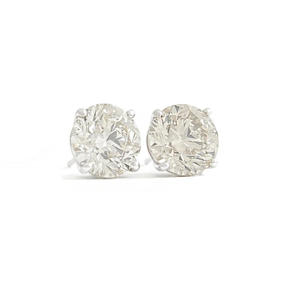 Round Champagne Diamond Stud Earrings 14K White Gold 4-Prong Basket 4.10 CTW: Round Champagne Diamond Stud Earrings 14K White Gold 4-Prong Basket 4.10 CTW These are lovely earrings! Please let us know if you have any questions. Diamonds: 2 round brilliant cuts, 4.10 ctw, champa