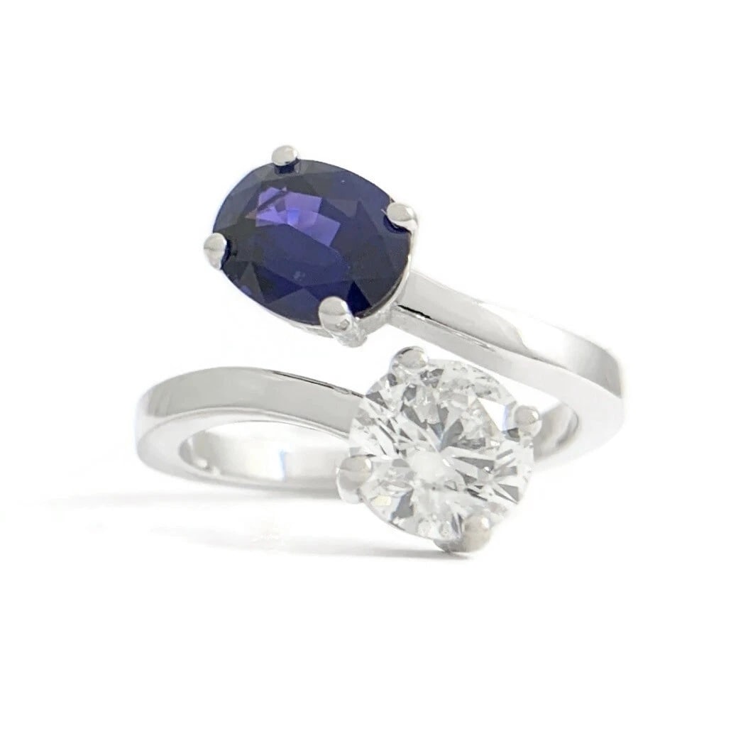 GIA Sapphire Diamond 2-Stone Wrap Bypass Statement Ring 14K White Gold 2.28 CTW: GIA Sapphire Diamond 2-Stone Wrap Bypass Statement Ring 14K White Gold 2.28 CTW This is a gorgeous and unique ring! Please let us know if you have any questions! Gemstone: 1 oval blue sapphire 1.26 ct