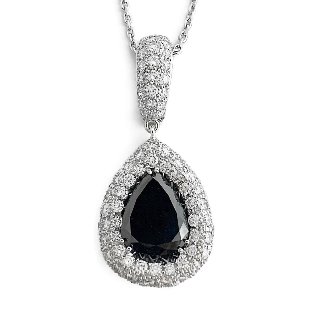 Black White Diamond Halo Teardrop Pendant Necklace 18K White Gold, 16.30 CTW: Black White Diamond Halo Teardrop Pendant Necklace 18K White Gold, 16.30 CTW Make a statement with this gorgeous necklace! Please let us know if you have any questions. Diamonds: 16.30 ctw; 1 pear sha