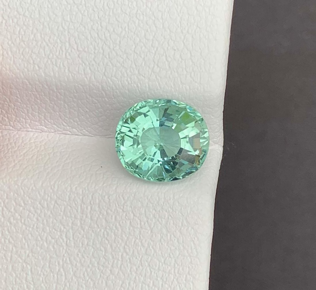 Chinook Color Tourmaline Gemstone: Natural October Birthstone, Africa (2.44 CT): Materials: Gemstone: Tourmaline Chinook Color Blue Tourmaline Gemstone: Natural October Birthstone, Africa Weight : 2.44 Carat Dimensions : 8.100 * 7.100 * 5.500 mm Shape : Oval Cut Clarity : Loupe Cl