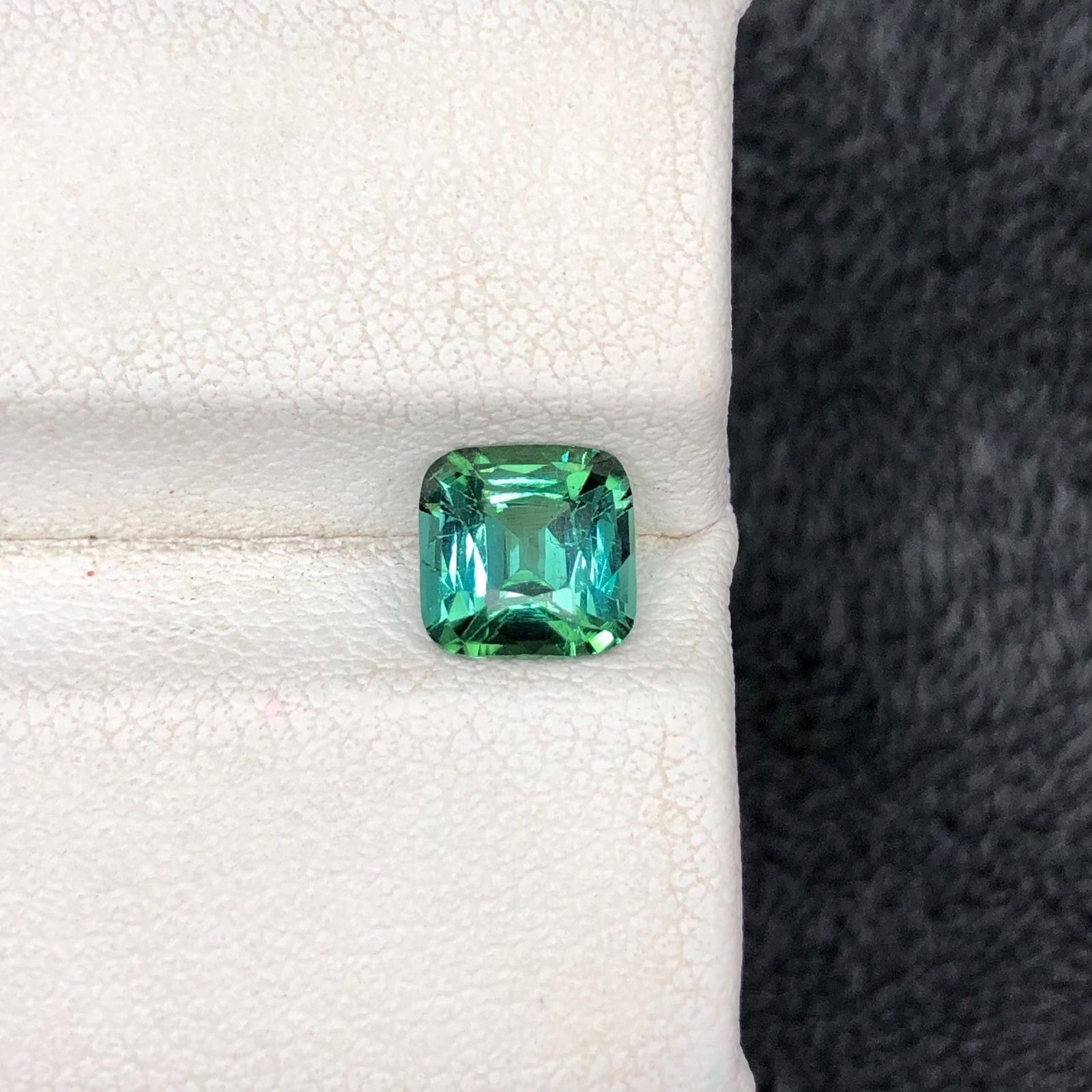 Blue Green Tourmaline Gemstone Ring Size Cushion Cut From Afghanistan - 1.27 Carat: Materials: Gemstone: Tourmaline Carat weight: 1.270 Gemology: * Weight : 1.270 carat * Dimension : 6.4*6.4*4.1 mm * Origin : Afghanistan * Colour: Blue Green * Clarity : Vvs * Shape : Square Cushion C