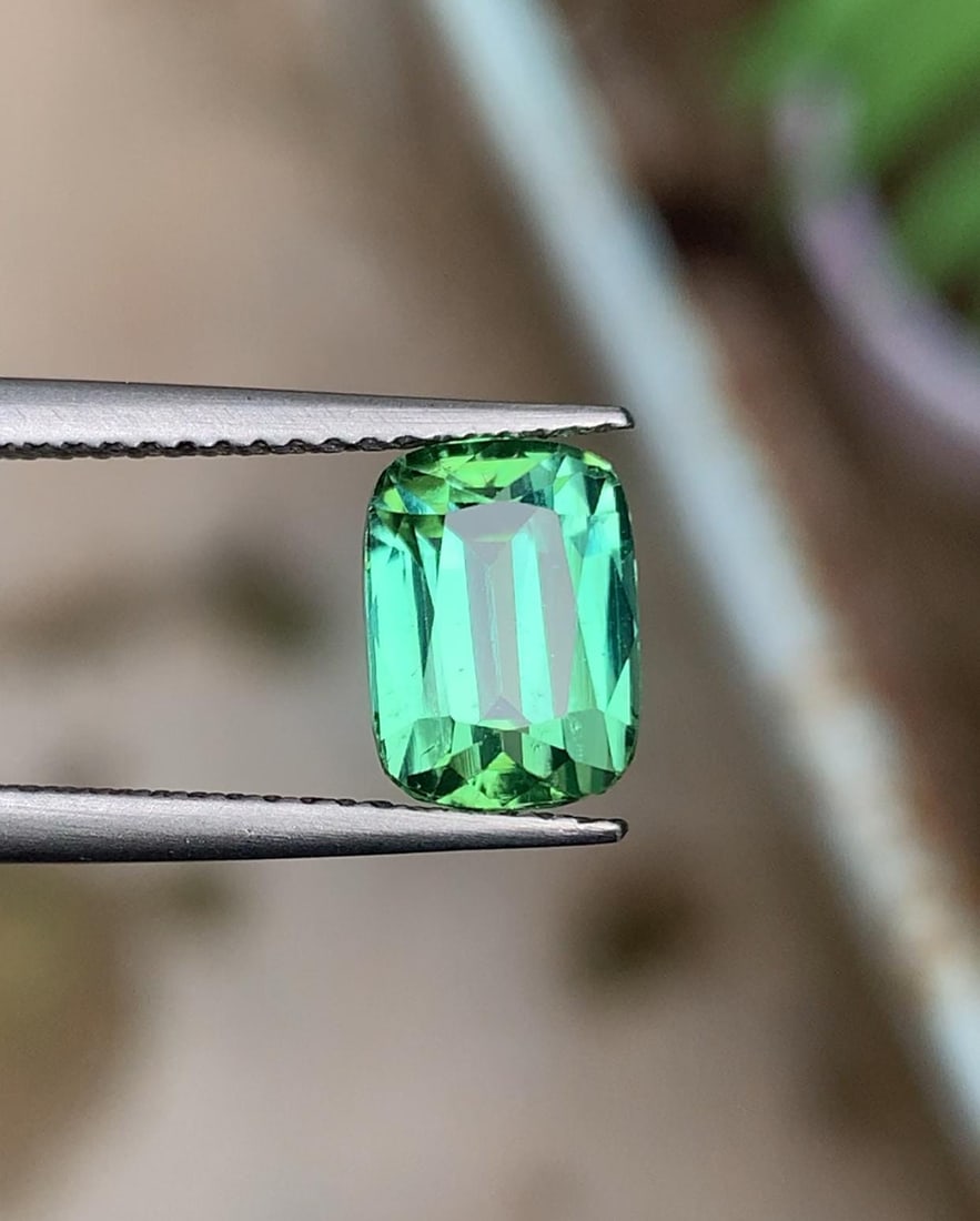 Afghan Bluish Green Tourmaline Gemstone Gemstone For Jewelry - 2.790 Carat: Materials: Gemstone: Tourmaline Carat weight: 2.790 Tourmaline Details: * Weight : 2.790 carat * Dimension : 8.9*6.5*5.6 mm * Shape : Cushion Cut * Colour : Blue & Green * Clarity : Loupe Clean * Orig