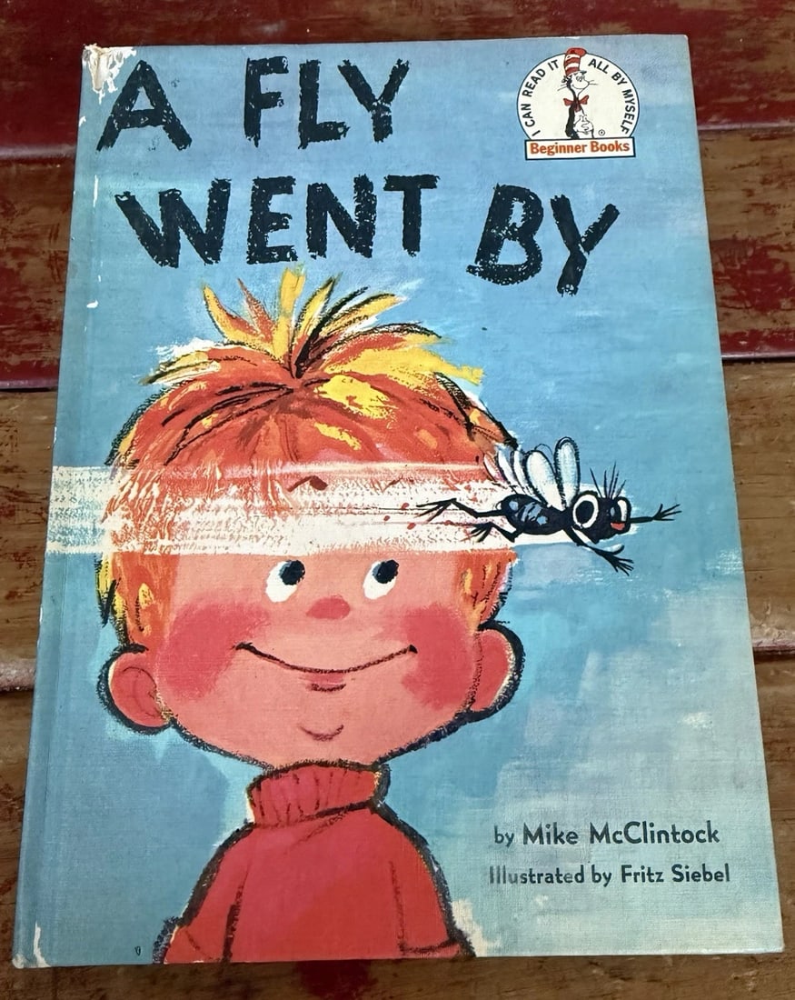 Dr. Seuss A Fly Went By 1958 Beginner Book BC Ed.Mike McClintock 1st Ed/Printing: The product is a hardcover first edition first printing of "A Fly Went By" by Mike McClintock from 1958, part of the Beginner Books series published by Random House. The book, illustrated by Fritz Sie
