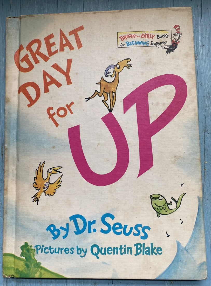Great Day for Up Bright & Early Grolier BC 1st Edition Hardcover Dr. Seuss 1974: Great Day for UP by Dr. Seuss, Illustrated by Quentin Blake Random House Grolier Book Club 1st Ed., no DJ. 1974. Hardcover. Covers toned from age. Wear to spine ends, lower tips. Very clean text block