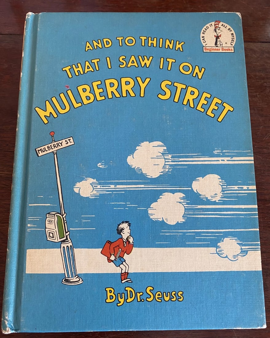 And To Think That I Saw It On Mulberry Street Dr. Seuss Book Club Later Print: This book is a first edition later printing Book Club edition of "And To Think That I Saw It On Mulberry Street" by Dr. Seuss, originally published in 1937 by Vanguard Press. Hardcover with pictorial 