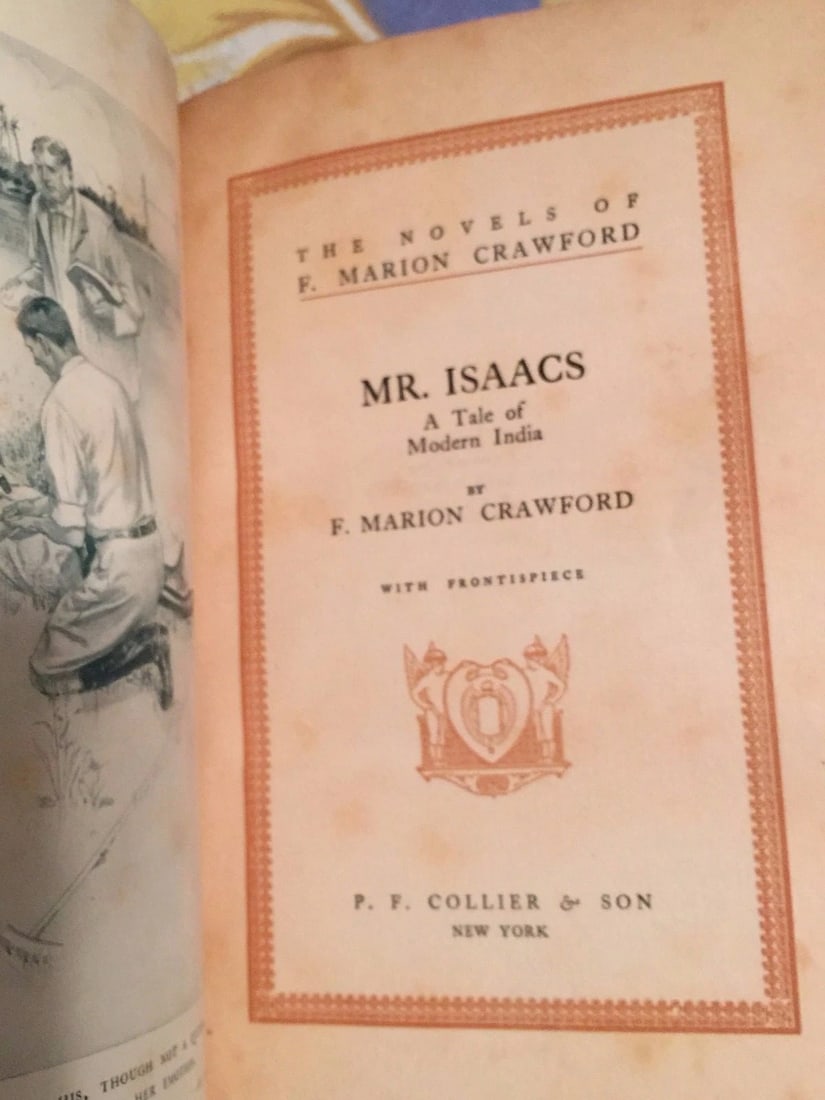 F. Marion Crawford MR. ISAACS A Tale of Modern India 1882 P.F.Collier & Son HC: MR. ISAACS A Tale of Modern India F. Marion Crawford. P.F. Collier & Son, 1882. Hardcover. Frontis.Binding tight with no missing, loose or torn pages. Pencil mark across ffep. Covers have gold & white