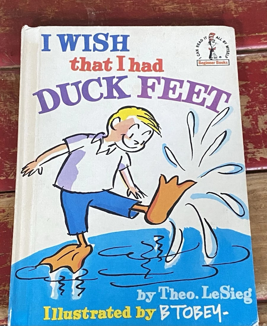 Dr Seuss, Theo LeSieg I Wish That I Had Duck Feet 1st Edition 1965 HC: Dive into the whimsical world of Dr. Seuss with "I Wish That I Had Duck Feet," authored by Theo LeSieg, Published in 1965 by Beginner Books / Random House, Grolier Book Club Edition, this hardcover ge