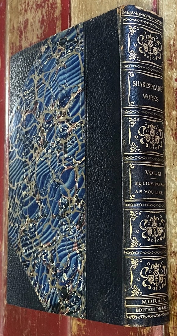 Shakespeare’s Works Elgin Ed.Vol. XI Julius Caesar, As You Like It Morris 1901: This antique book is a luxury edition of Shakespeare's Works Elgin Ed. Vol. XI Julius Caesar, As You Like It. It features a partial leather binding with marbled boards and was published by John D. Mor