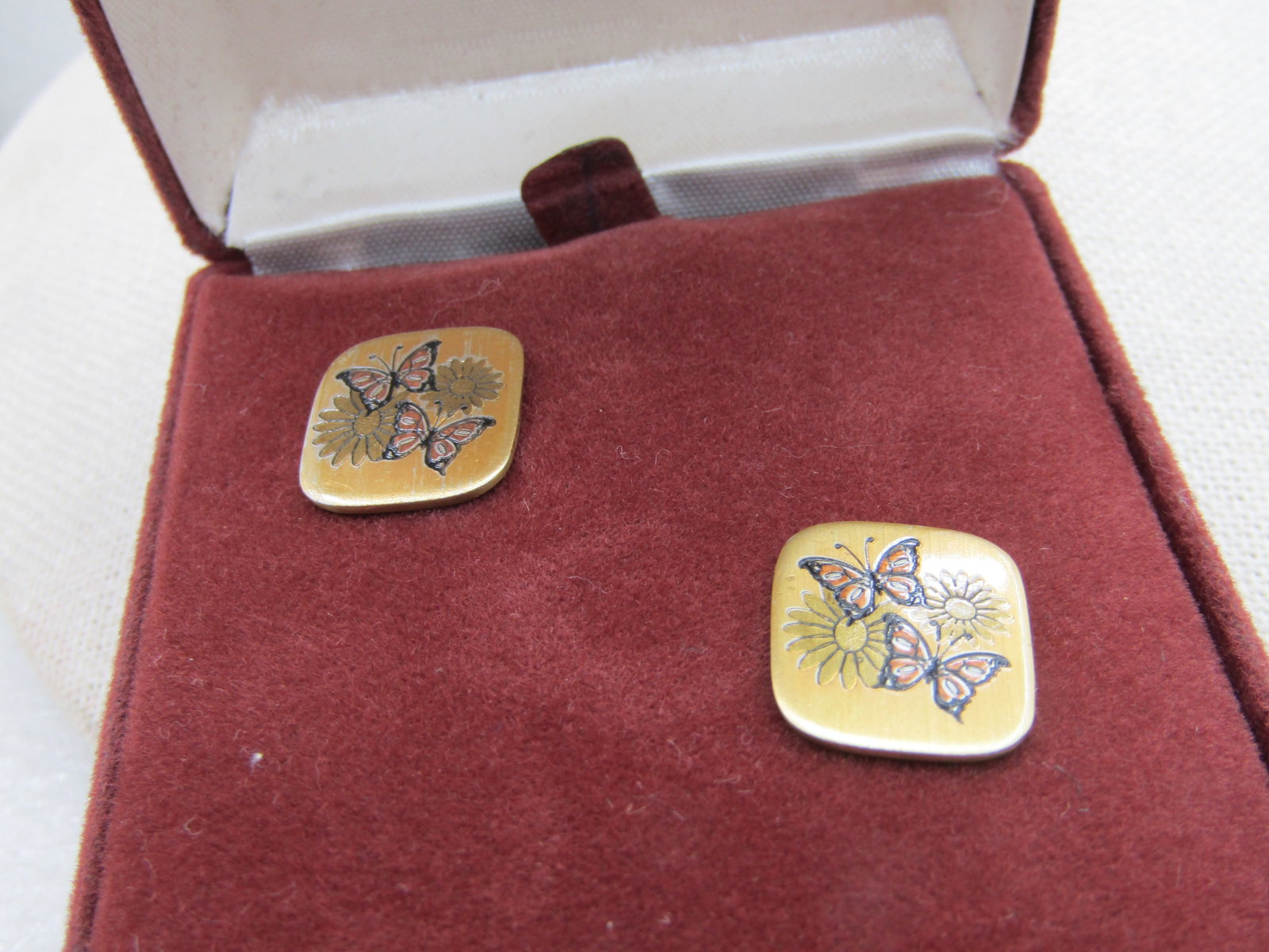 Vintage Reed & Barton Damascene Butterflies Earrings, Pierced, New Vintage in Box: Vintage Reed & Barton Damascene Butterflies Earrings, pierced. They are 3/4" tall and 1/2" wide in original box with insert cart. They have a gold background with copper, black and yellow tones. The i