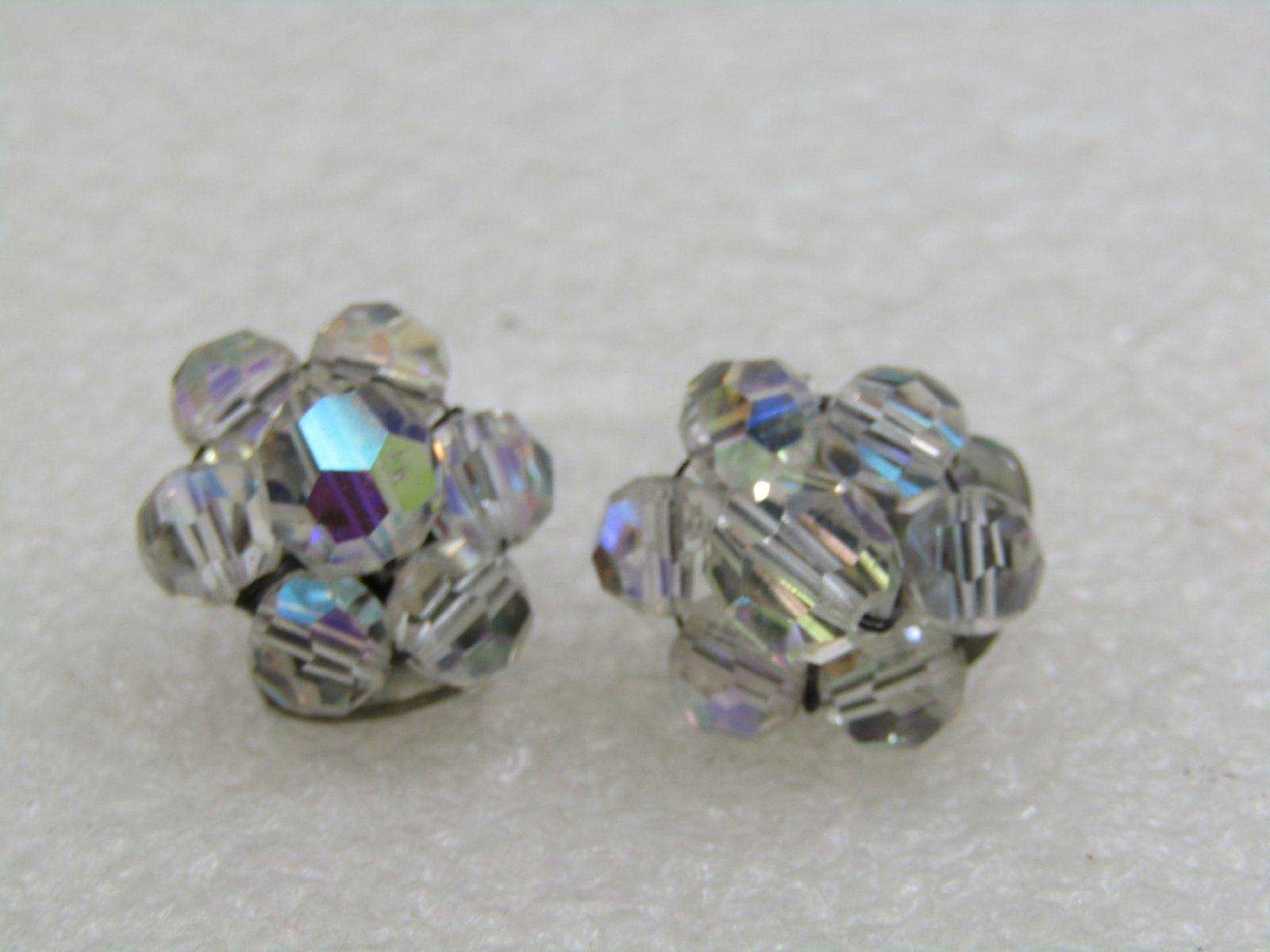 Vintage Aurora Borealis Crystal Beaded Earrings, 5/8": Vintage Aurora Borealis Crystal Beaded Earrings, 5/8" round, silver tone setting, 1940's. Not signed by th maker. Very good condition. (W.91920.5 SS6922 AZ LEB* LD 4/9/22). Reserve: $15.00 Shipping: D