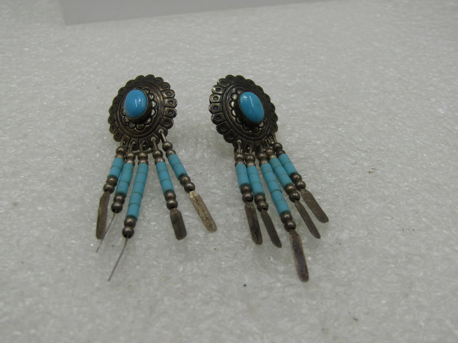 Vintage Southwestern Concho Turquoise Drop Earrings, Signed Q.T.: Vintage Southwestern Concho Turquoise Drop Earrings, Signed Q.T. which is Quoc Turquoise which was a shop that sold things, not a Native American mark but still very nice pieces. These earrings are