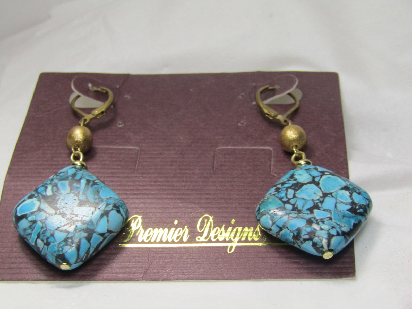 Vintage Faux Turquoise Lever Back errings, Pierced. Premier Designs: Vintage Faux Turquoise Lever BackEarrings, Pierced. Premier Designs. Reserve: $30.00 Shipping: Domestic: Flat-rate of $7.00 to anywhere within the contiguous U.S. International: Foreign shipping rates