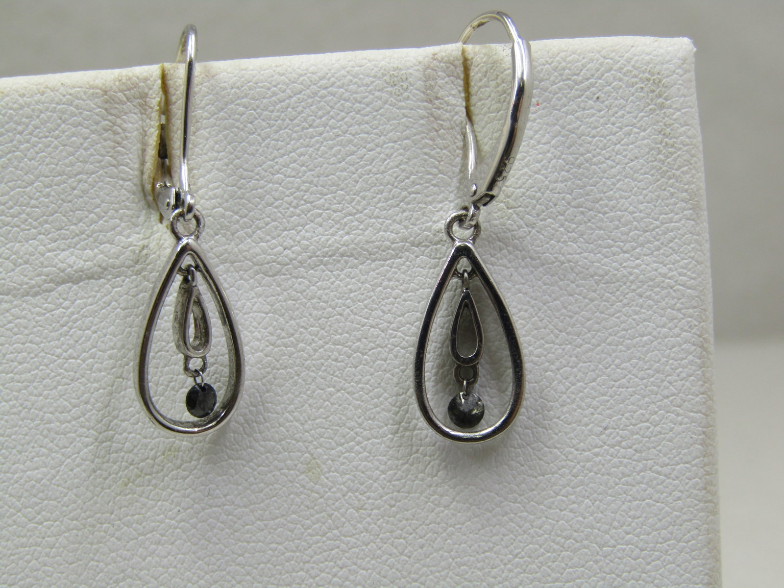 Vintage Stering Hoop with Drop Earrings, Pierced Leverback: Vintage Stering Hoop with Drop Earrings, Pierced Leverback. They have a teardrop hoop and a tear drop open drop in the center with a hematite stone dangling, signed NAJ and marked .925 and tested . We