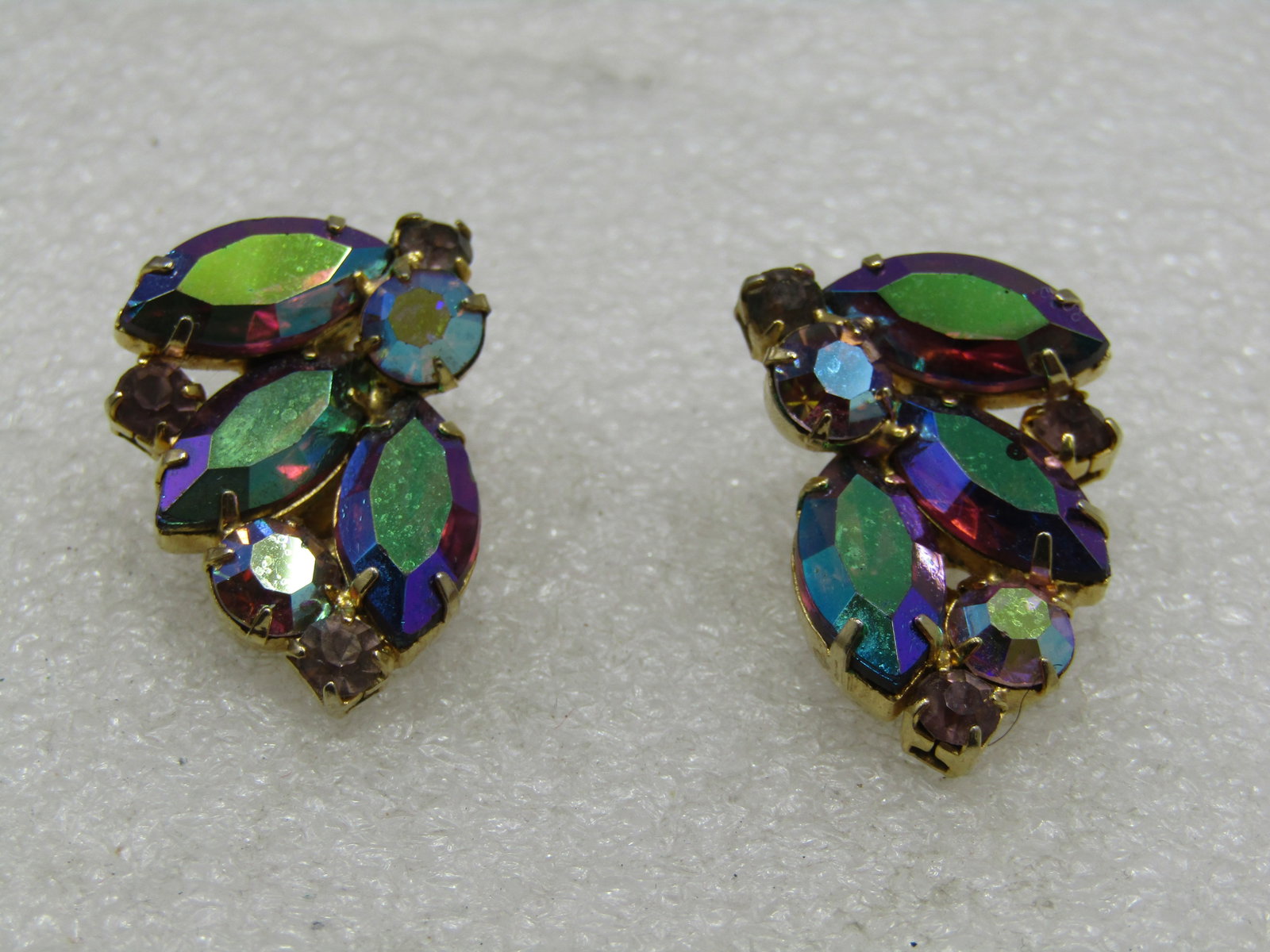 Vintage Aurora Boralis Rhinestone Clip Earrings, Peacock Hues: Vintage Aurora Boralis Rhinestone Clip Earrings, Peacock Hues, 1960's. Marquise and round stones. The round stones are more clear with the lightler peacock aurora borealis shimmer while the larger