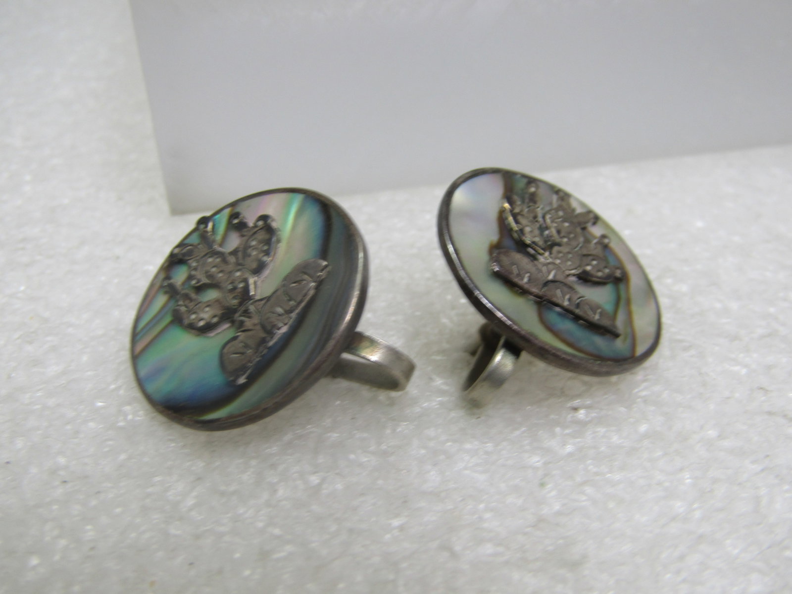 Vintage Sterling Mexican Abalone Cactus Earrings, Screwback, 1950's-1960's: Vintage Sterling Mexican Abalone Cactus Earrings, Screwback, 1950's-1960's. These have abalone inlaid in a round setting with a cactus in sterling over top. The earrings are appx. 7/8" across. They ar